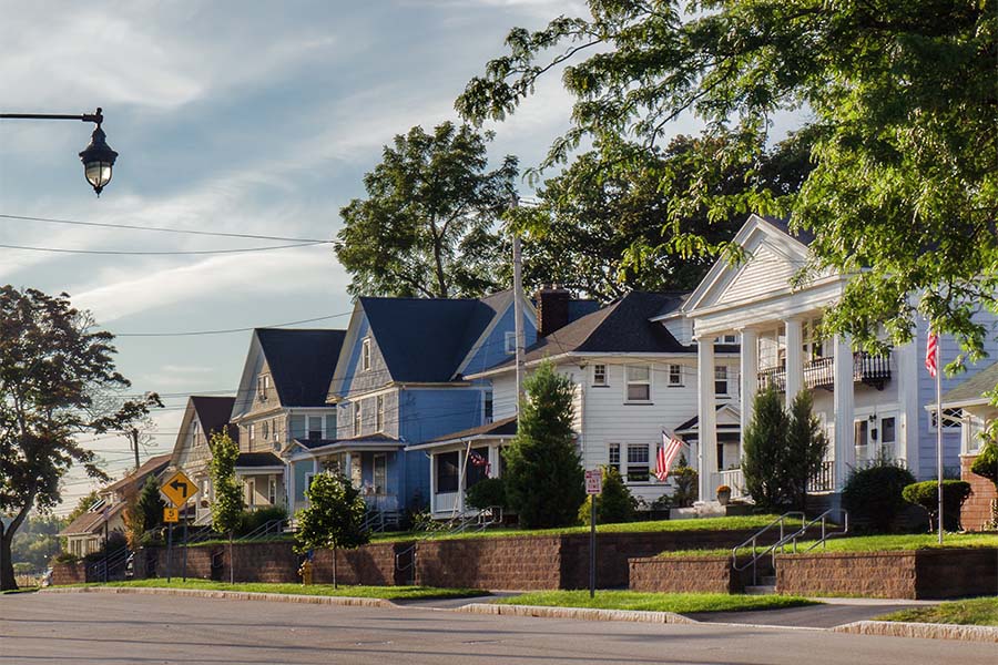 Charlotte, MI - View of a Row of Houses on a Quiet Street in a Residential Neighborhood in Charlotte Michigan